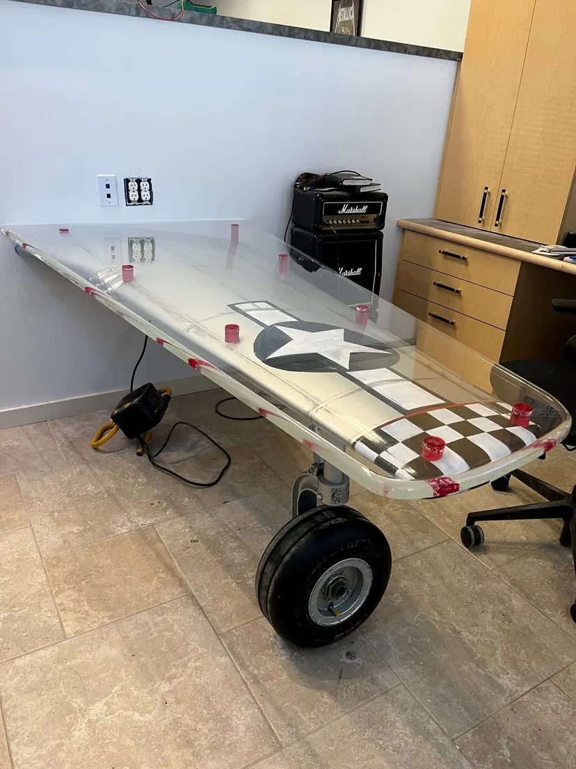 Wing desk built from repurposed aircraft wing